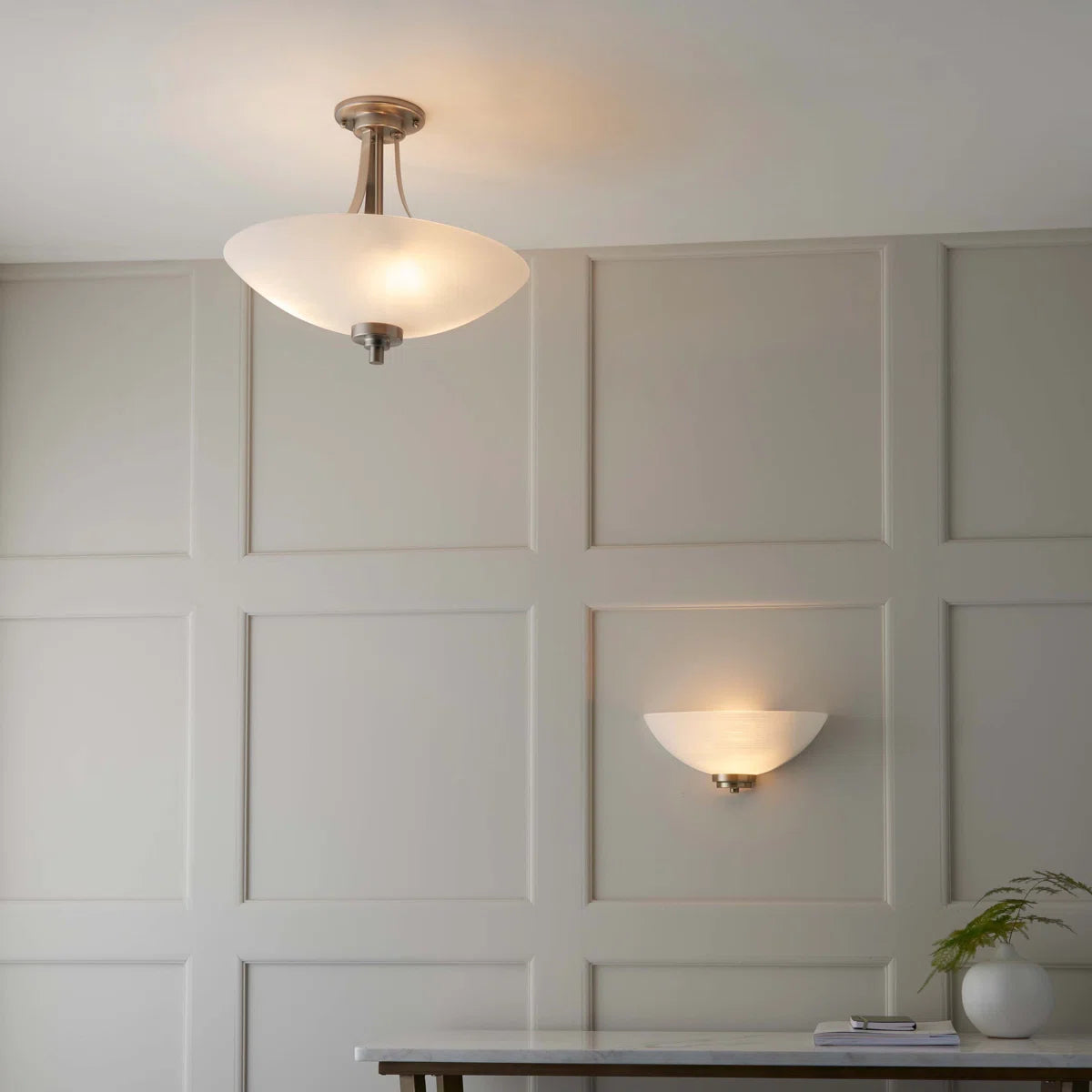 Miltiades glass semi-flush mount ceiling light from TheChandelierCo with clear glass shade and modern design.