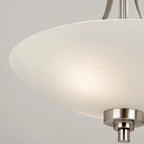 Elegant Miltiades glass semi-flush mount ceiling light by TheChandelierCo with clear glass shade and brushed metal finish.