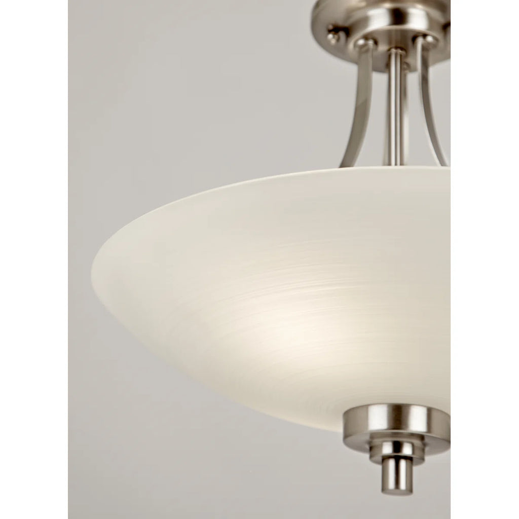 Glass semi-flush mount ceiling light by TheChandelierCo with a sleek, modern design and clear glass shade.