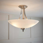 Miltiades glass semi-flush mount ceiling light by TheChandelierCo featuring a clear glass shade and modern design.