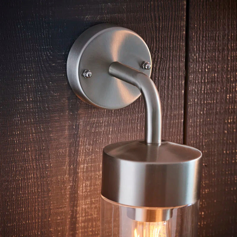 Myla 21cm H outdoor wall lantern by TheChandelierCo, with classic design, clear glass panels, and black metal frame for exterior lighting.