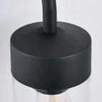 Myla 21cm H outdoor wall lantern by TheChandelierCo featuring a black metal frame and clear glass panels for exterior lighting.