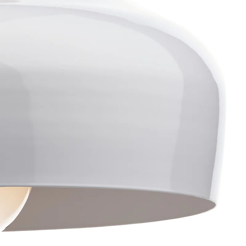 Nataly 1 light dome pendant by TheChandelierCo hanging from ceiling with a sleek, modern design and warm lighting.