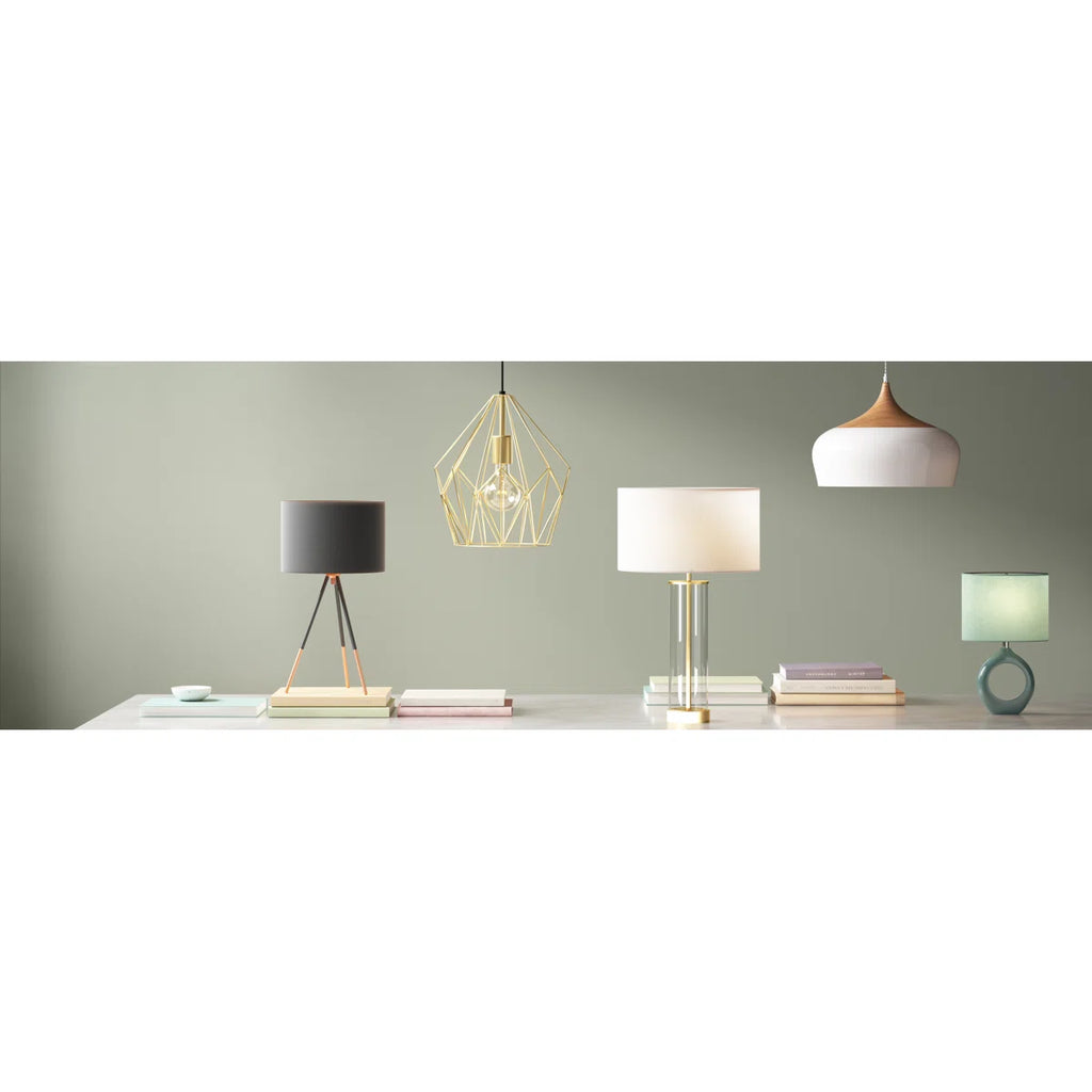 Nataly 1 Light Dome Pendant by TheChandelierCo hanging with a sleek, modern design and a warm light diffuser.