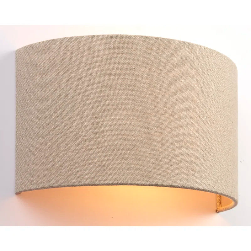 Paige Steel flush-mounted sconce with a modern design, featuring a sleek steel finish and a minimalist wall-mounted fixture.