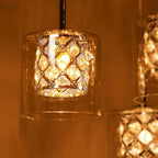 Modern 10-light glass crystal pendant chandelier with G9 bulbs, adjustable height, hanging at 230cm, by TheChandelierCo.