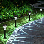 Set of 10 plastic solar-powered pathway lights by TheChandelierCo, outdoor garden lights with stakes and LED solar panels.