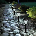 Set of ten plastic solar-powered pathway lights by TheChandelierCo, with solar panels and LED bulbs for outdoor lighting.