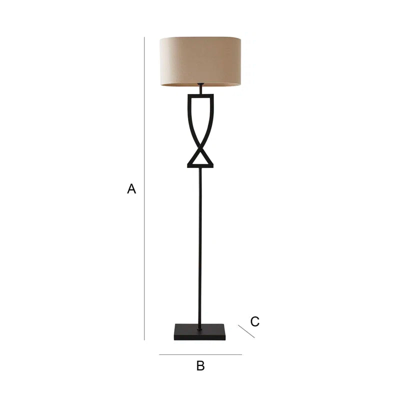 Black Randalstown floor lamp by TheChandelierCo with a sleek tall design and modern style, standing on a flat surface in a well-lit room.