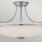 Elegant Rockwood Glass Semi Flush Mount ceiling light by TheChandelierCo with clear glass shade and polished metal finish.