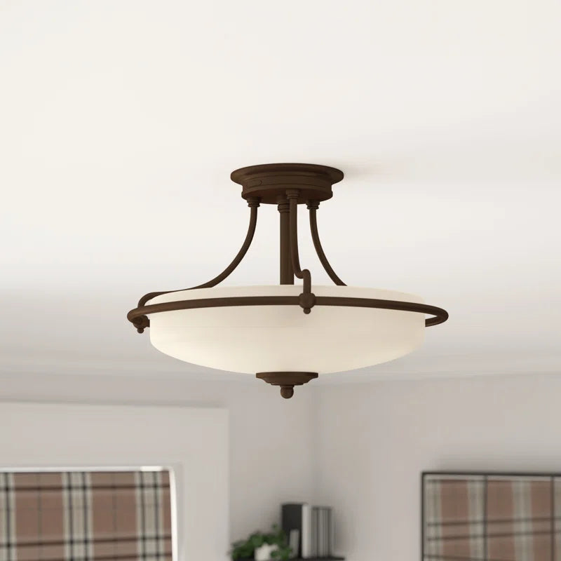 Elegant Rockwood glass semi flush mount ceiling light by TheChandelierCo, featuring a sleek, modern design and clear glass shade.
