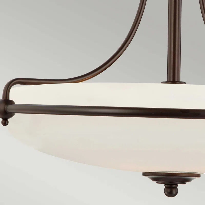 Elegant Rockwood Glass Semi Flush Mount chandelier by TheChandelierCo with clear glass shades and brushed metal finish.