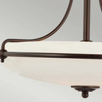 Elegant Rockwood Glass Semi Flush Mount chandelier by TheChandelierCo with clear glass shades and brushed metal finish.