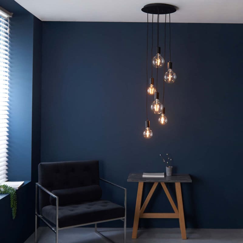 Drishya 6 Light Cluster Pendant by TheChandelierCo featuring six elegant glass pendant lights hanging in a cluster design.