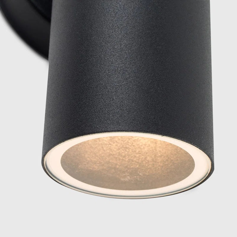 Set of two Schrager Matt Black outdoor armed sconces with four bulbs each, featuring modern, industrial-style lighting.