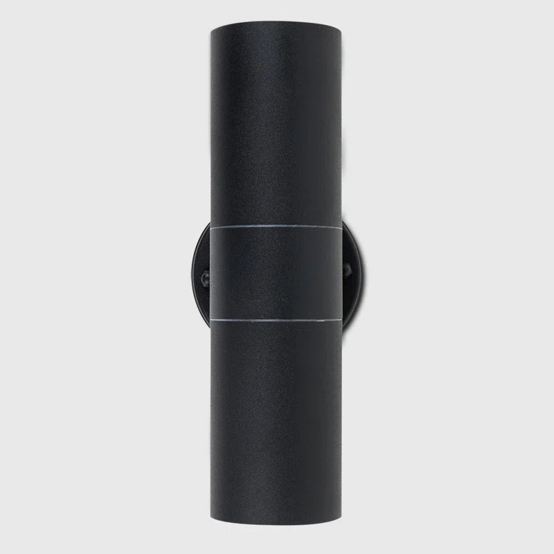 Set of two Schrager matte black outdoor armed sconces with four exposed bulbs, designed for exterior wall lighting.