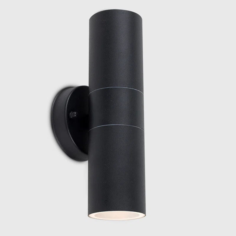 Set of two Schrager matte black outdoor armed sconces with four bulbs each, designed for exterior lighting and stylish illumination.