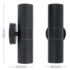 Set of two Schrager matte black outdoor armed sconces with four bulbs, ideal for exterior lighting and modern home decor.