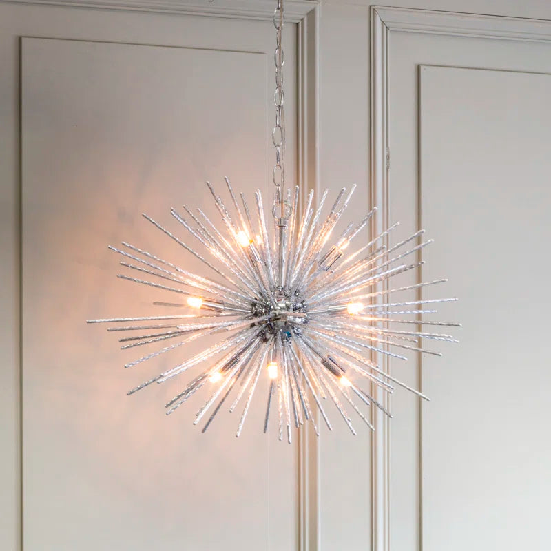 Sherlyn 9 light Sputnik chandelier by TheChandelierCo featuring a modern, starburst design with multiple exposed bulbs and a sleek metallic finish.