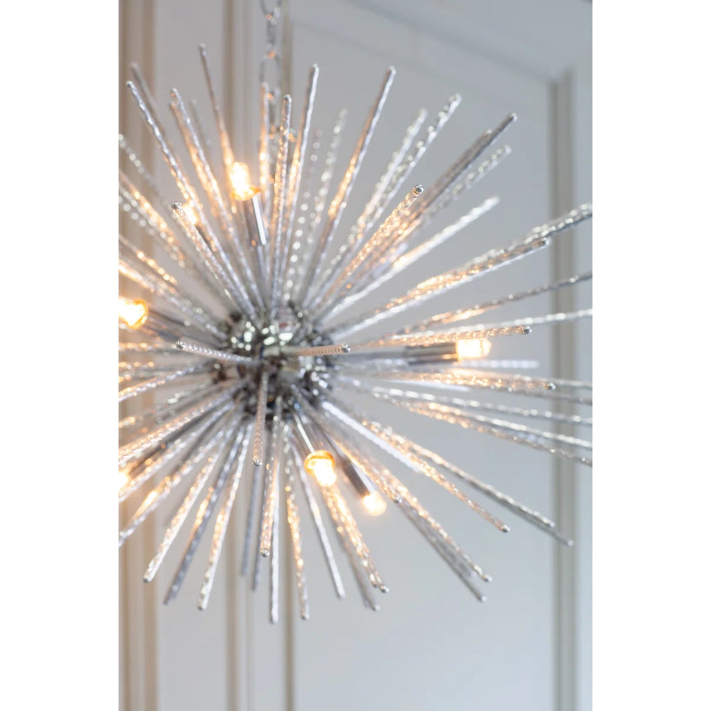 Sherlyn 9 Light Sputnik Chandelier by TheChandelierCo featuring a modern metallic design with nine exposed bulbs.