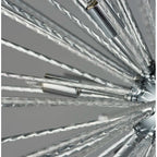 Sherlyn 9 Light Sputnik Chandelier by TheChandelierCo featuring a modern, starburst design with multiple light fixtures on a metal frame.