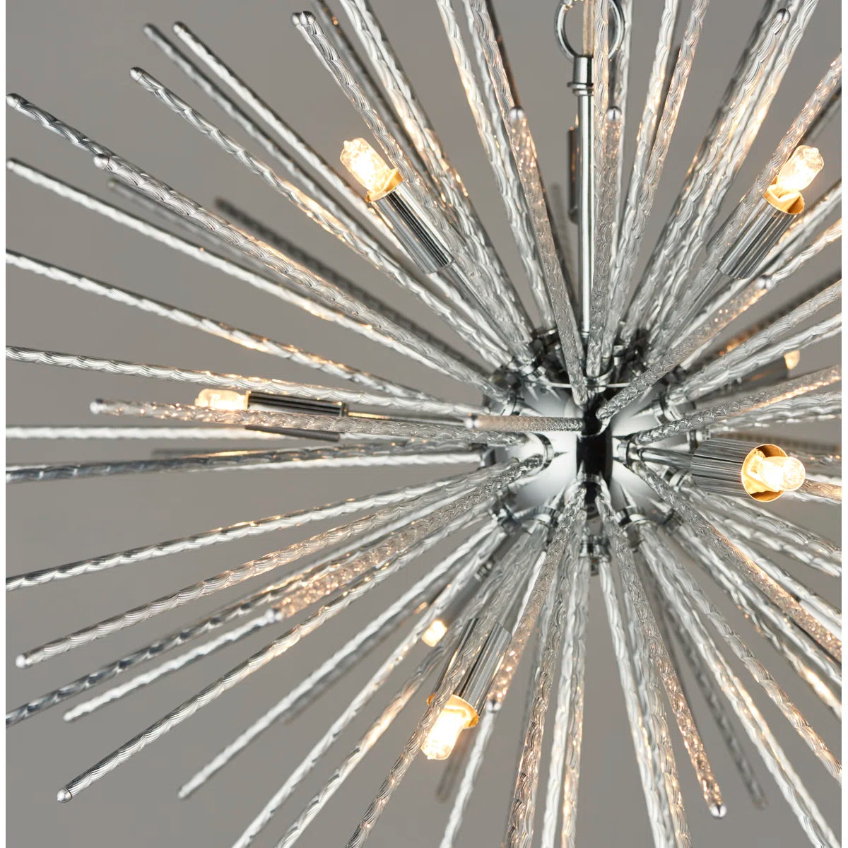 Sherlyn 9 Light Sputnik Chandelier by TheChandelierCo featuring a modern design with multiple light bulbs and a metallic finish.