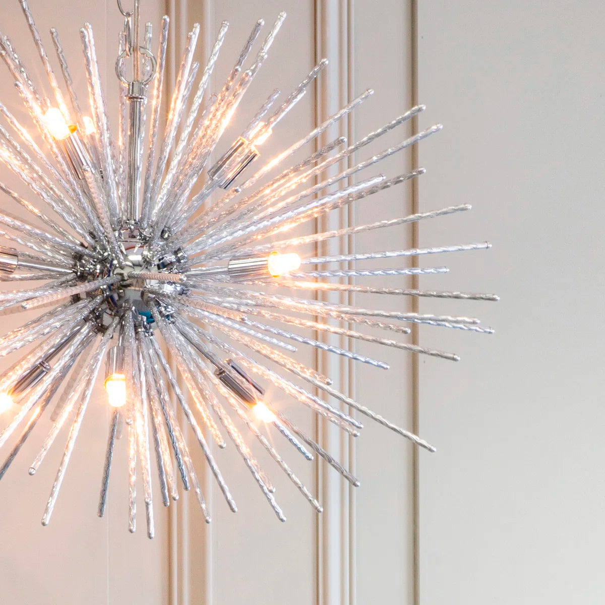 Sherlyn 9 light Sputnik chandelier by TheChandelierCo with multiple gold-finished arms and exposed bulbs, modern ceiling light fixture