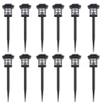 Set of 12 solar-powered LED pathway lights by TheChandelierCo, with integrated lights and sleek design for outdoor illumination.