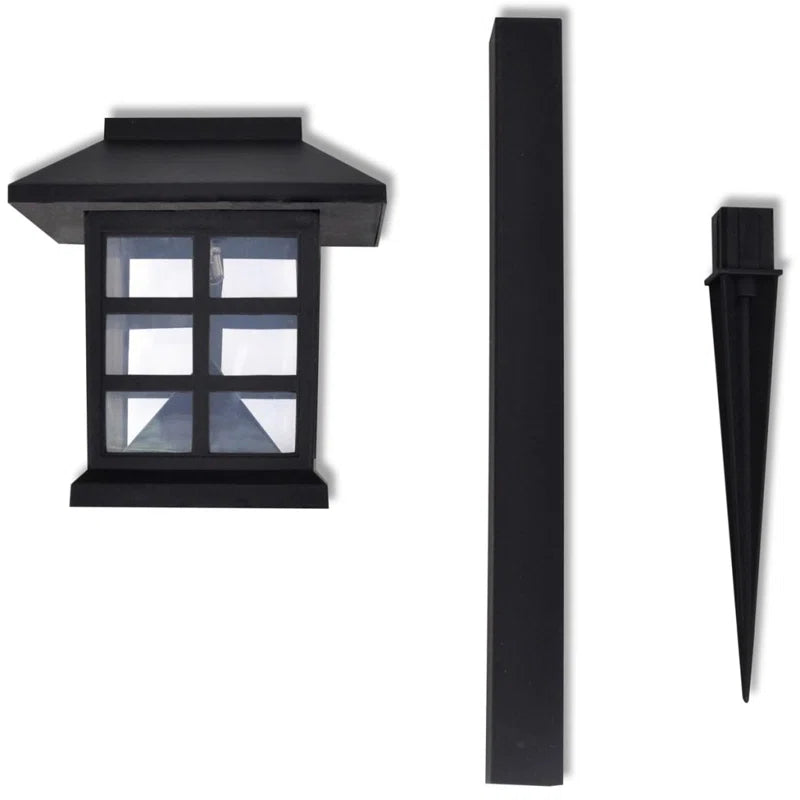 Set of 12 solar-powered LED pathway lights with integrated design, ideal for outdoor garden or walkway illumination by TheChandelierCo.