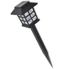 Set of 12 solar-powered pathway lights with integrated LED bulbs, weather-resistant design for outdoor garden or walkway illumination.