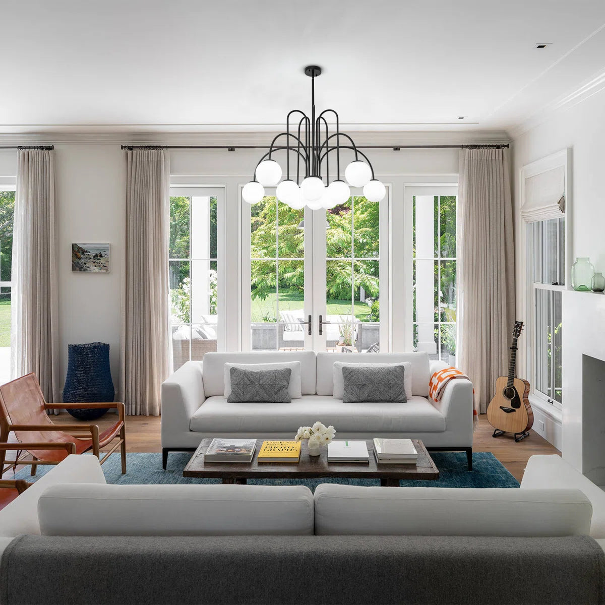 Modern Sputnik ceiling light by TheChandelierCo featuring 10 glass bubble bulbs and a sleek, contemporary design.
