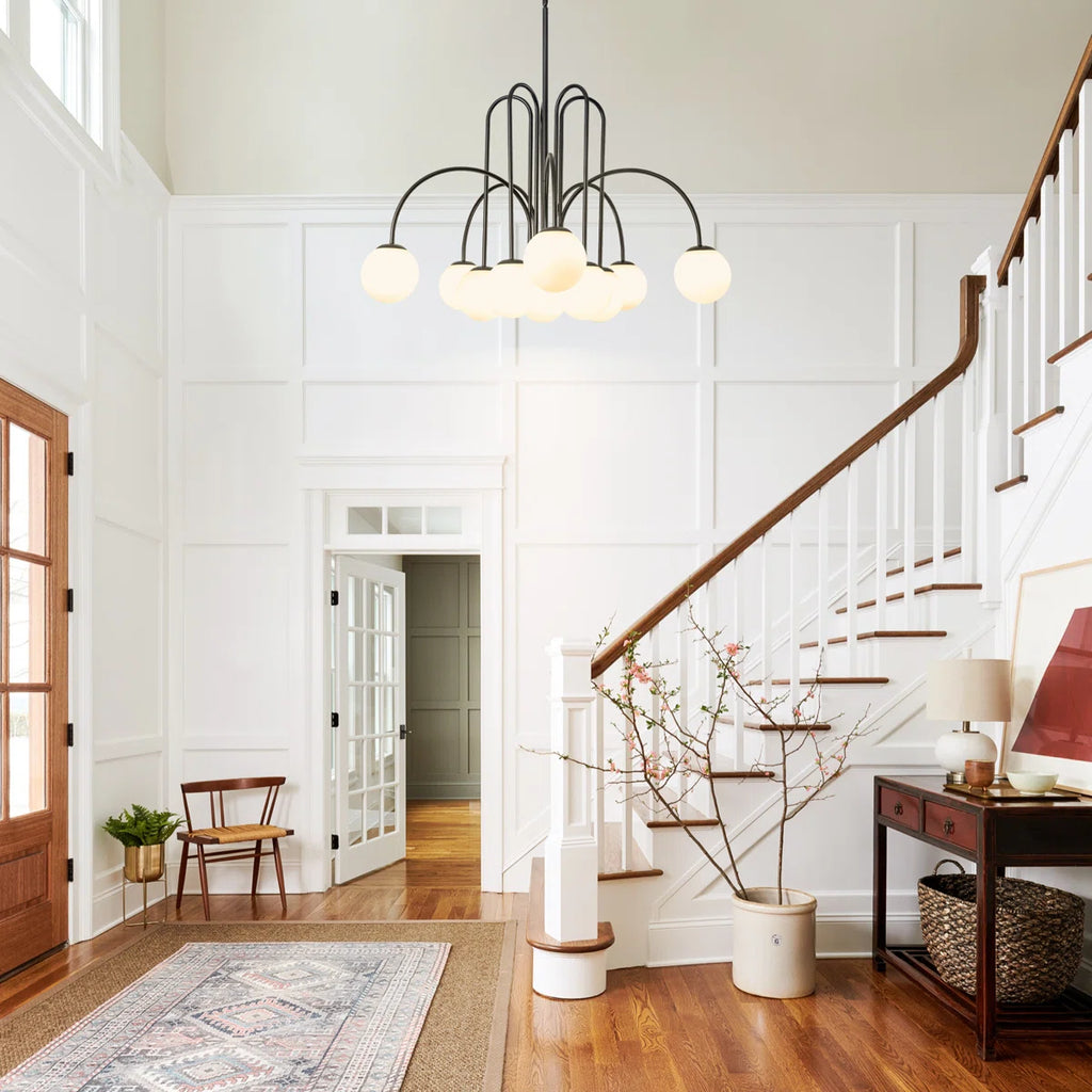 Modern Sputnik ceiling light by TheChandelierCo with 10 glass bubble bulbs and a sleek metallic finish.