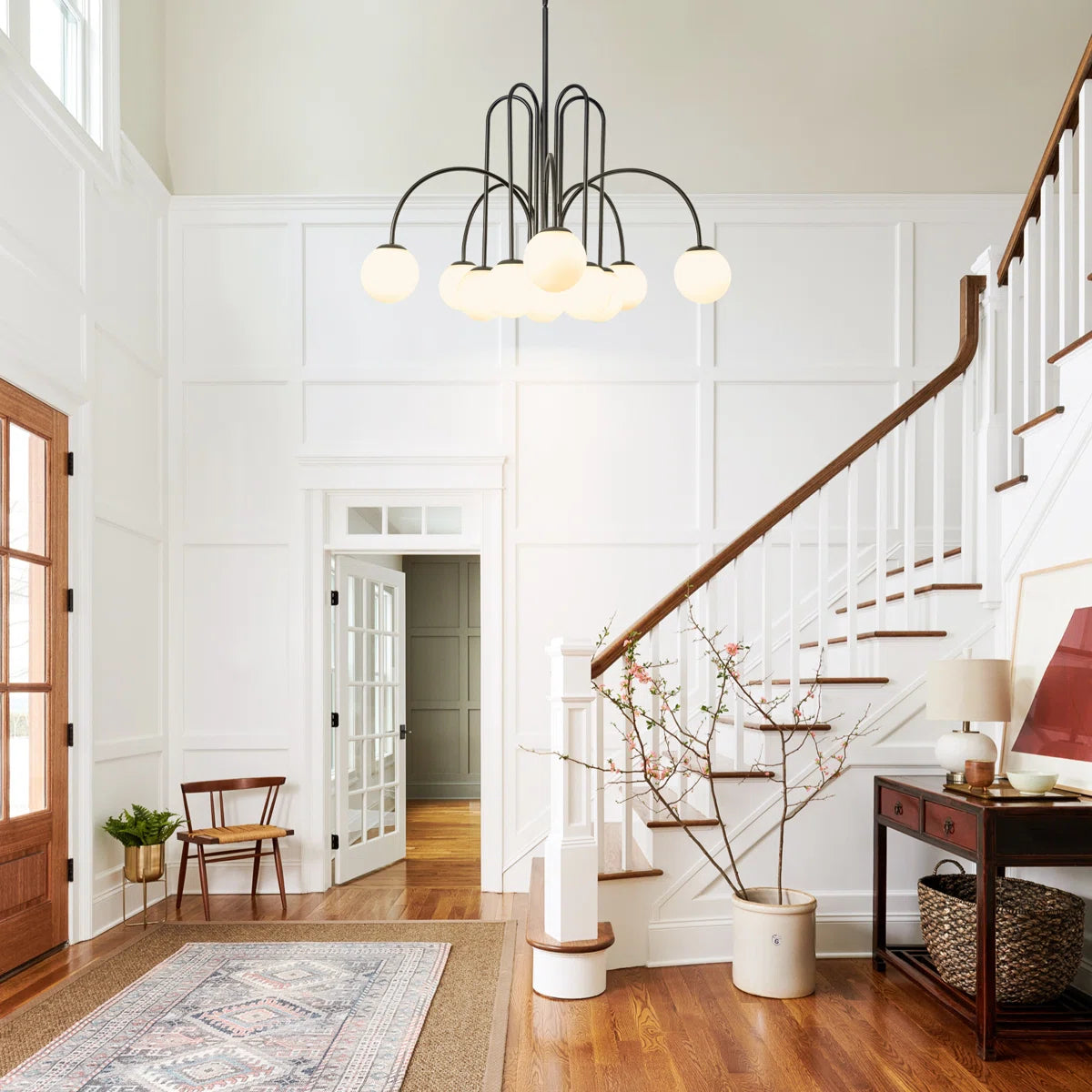 Modern Sputnik ceiling light by TheChandelierCo with 10 glass bubble bulbs and a sleek metallic finish.
