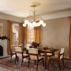 Modern Sputnik ceiling light with 10 glass bubble bulbs, sleek design, and chrome finish by TheChandelierCo.