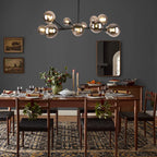 Modern Spoffo 15-light glass bubble chandelier by TheChandelierCo, featuring contemporary sputnik design for kitchen island lighting.
