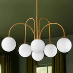Gold Sputnik ceiling light with six frosted white glass globes, modern contemporary chandelier by TheChandelierCo.