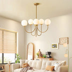 Six-light gold Sputnik ceiling light with frosted white glass globe bubbles, modern contemporary chandelier by TheChandelierCo.