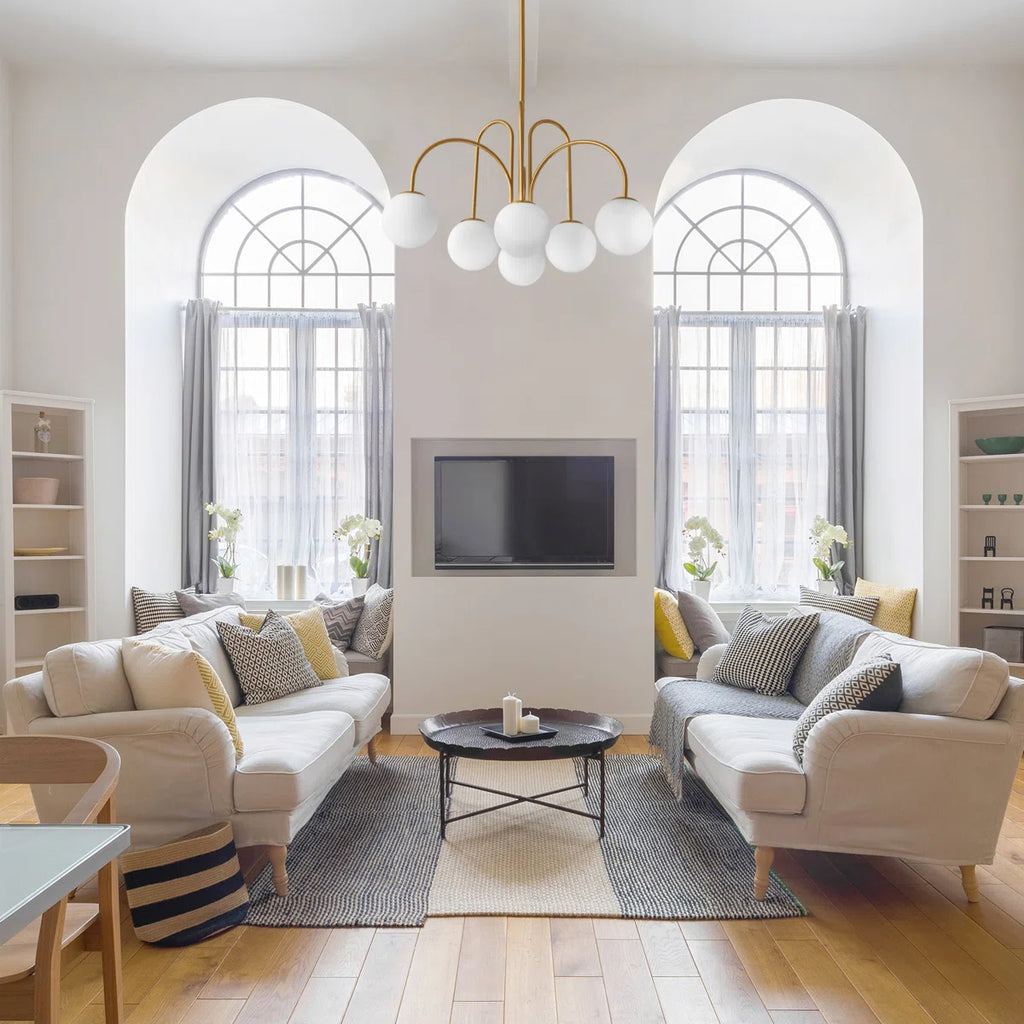 Contemporary gold Sputnik ceiling light with six frosted white glass globes, bubble chandelier design by TheChandelierCo.