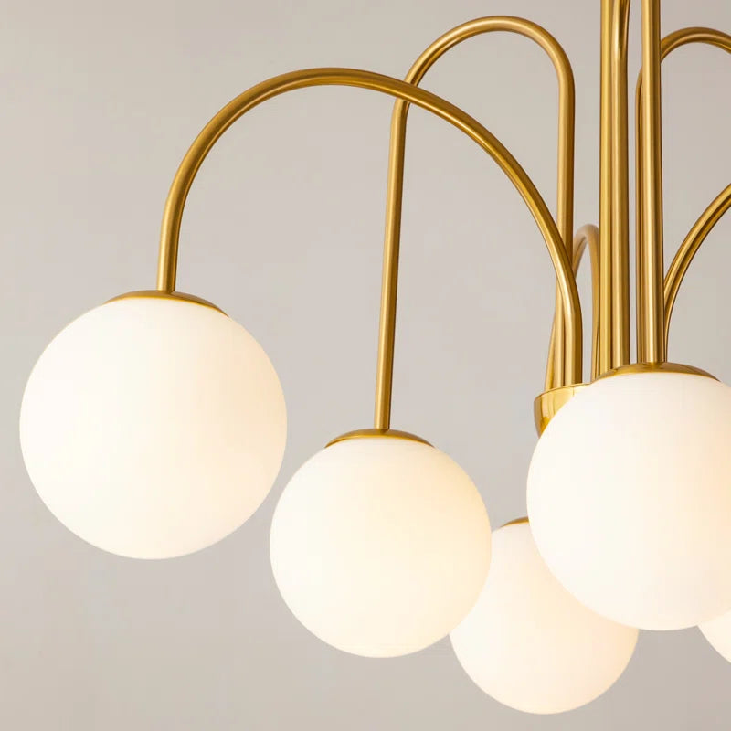 Six-light gold Sputnik ceiling chandelier with frosted white glass globe bubbles, modern contemporary design by TheChandelierCo.
