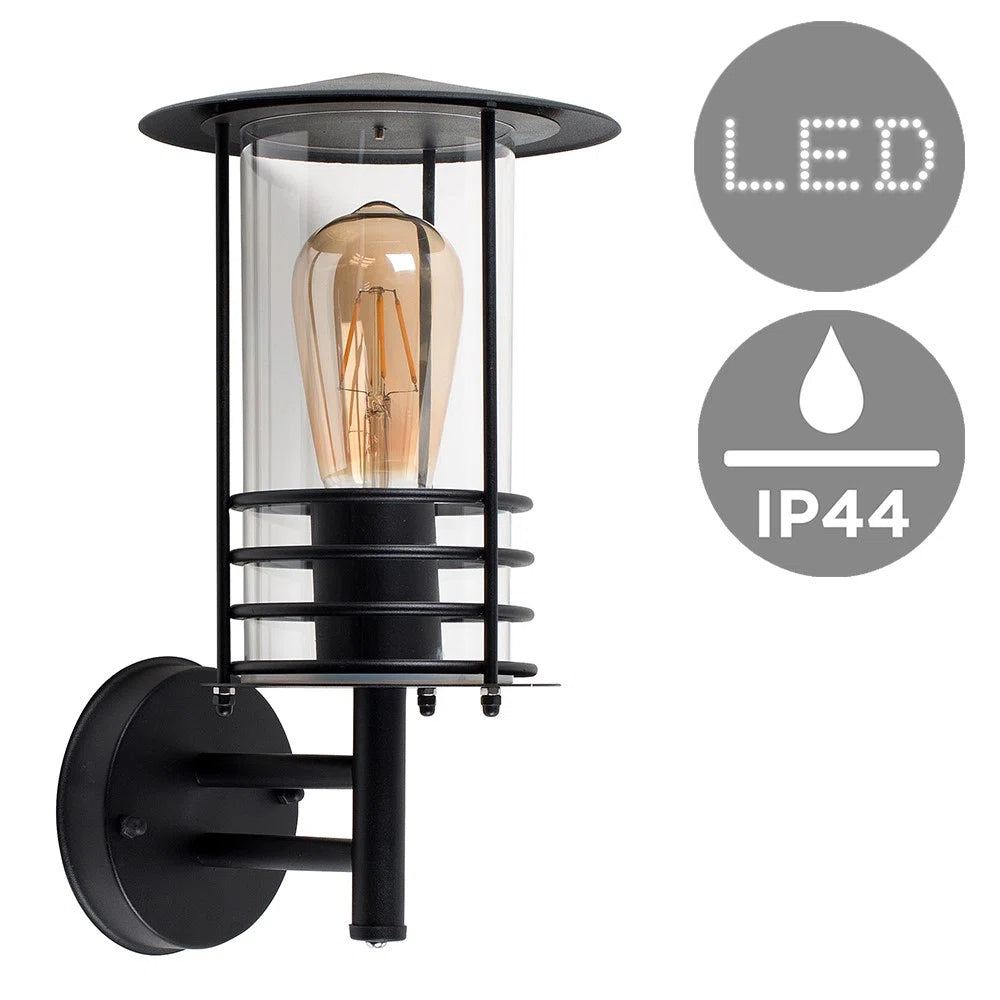 Black outdoor wall lantern with a classic design, featuring a metal frame and glass panels, perfect for outdoor lighting.