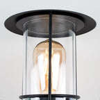 Black outdoor wall lantern with classic design and clear glass panels, suitable for outdoor lighting by TheChandelierCo.