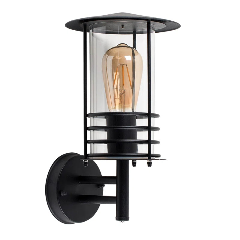 Black outdoor wall lantern with a classic design and clear glass panels, perfect for exterior lighting by TheChandelierCo.