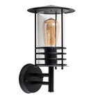 Black outdoor wall lantern with a classic design and clear glass panels, perfect for exterior lighting by TheChandelierCo.