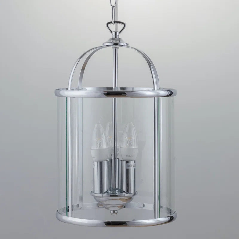 Three-light lantern pendant by TheChandelierCo featuring a classic design with metal framing and glass panels.