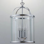 Three-light lantern pendant fixture from Strasburg 3 by TheChandelierCo featuring metal frame and glass panels