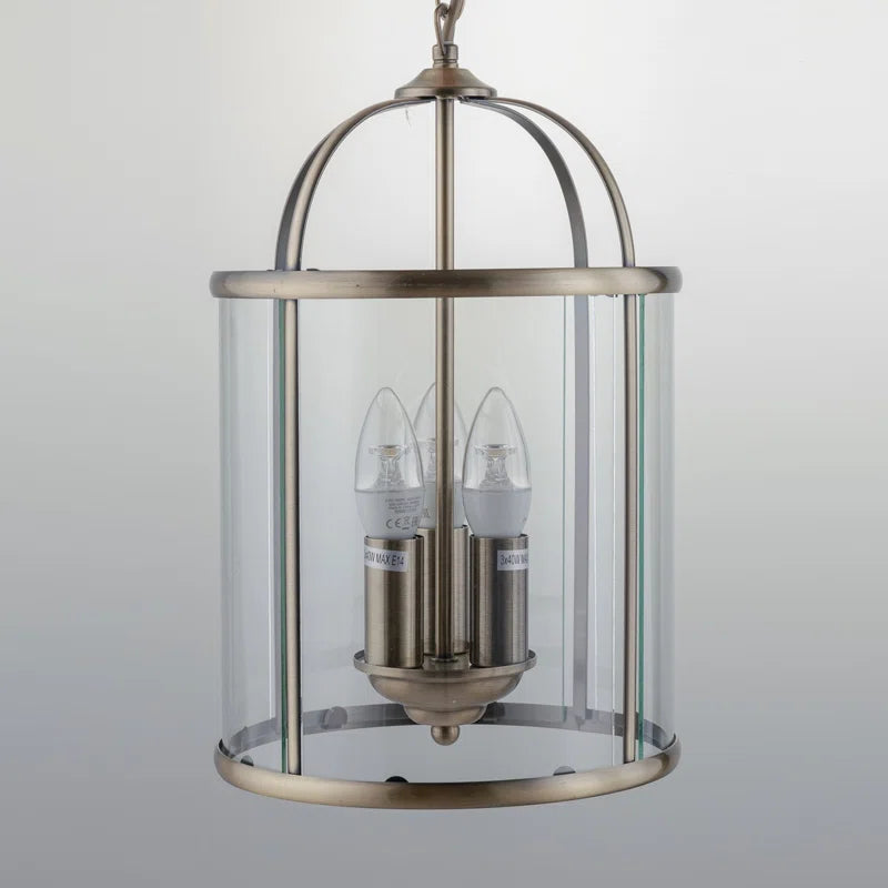 Strasburg 3-Light Lantern Pendant by TheChandelierCo, hanging light fixture with vintage lantern design and metal frame.