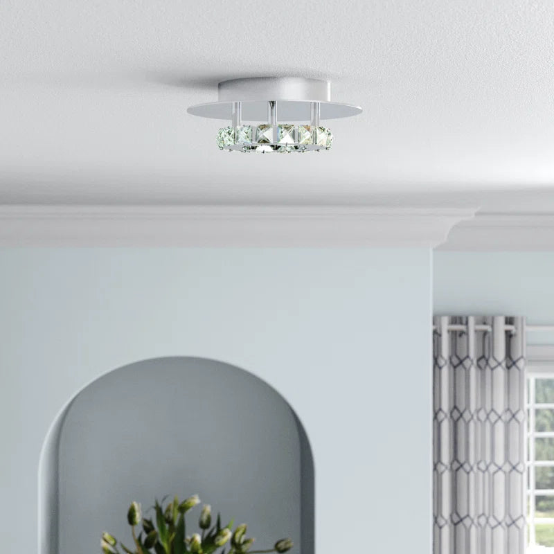 Tarren Glass LED Flush Mount ceiling light by TheChandelierCo featuring a round glass shade and modern design.