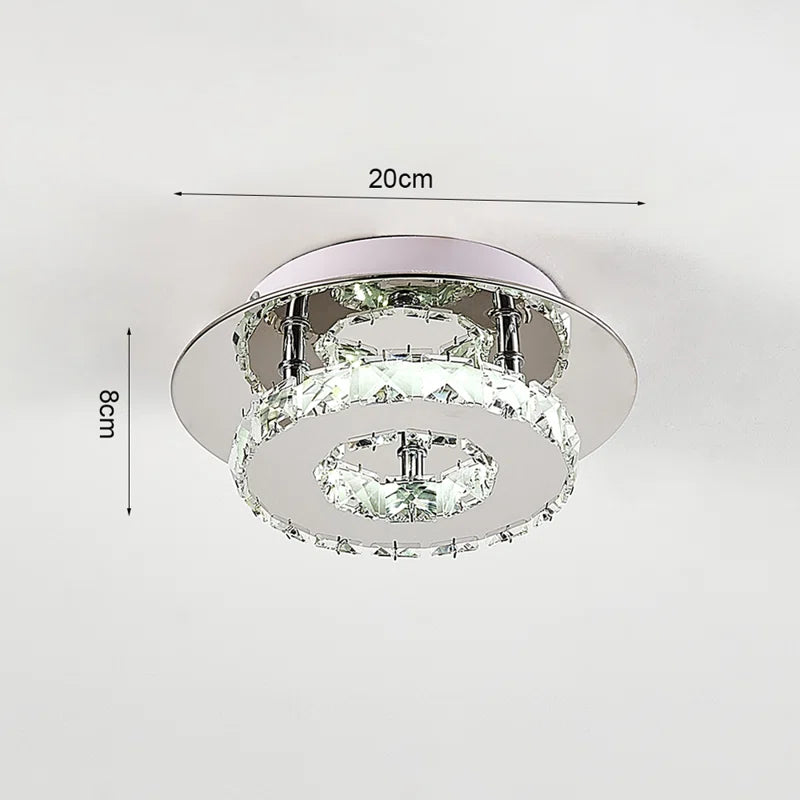 Tarren Glass LED flush mount ceiling light by TheChandelierCo featuring a modern clear glass design and integrated LED lighting.
