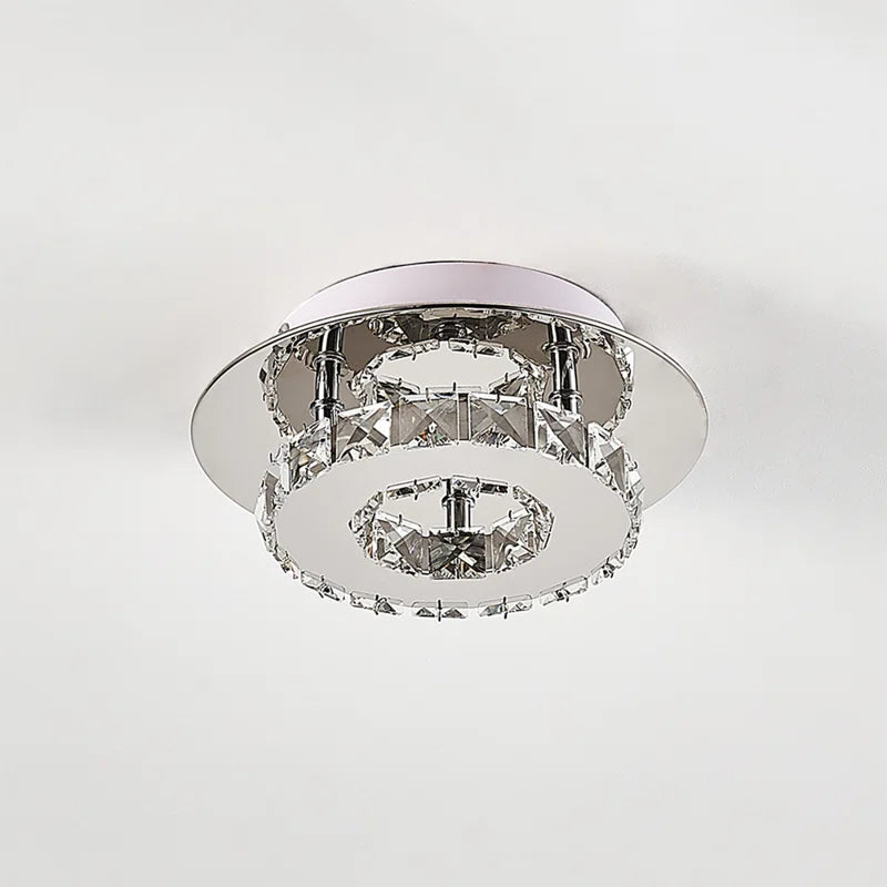 Tarren Glass LED flush mount ceiling light by TheChandelierCo featuring a sleek, modern design with a glass shade and integrated LED lighting.