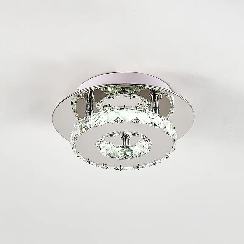 Tarren Glass LED flush mount ceiling light by TheChandelierCo featuring a modern glass design and sleek white finish.